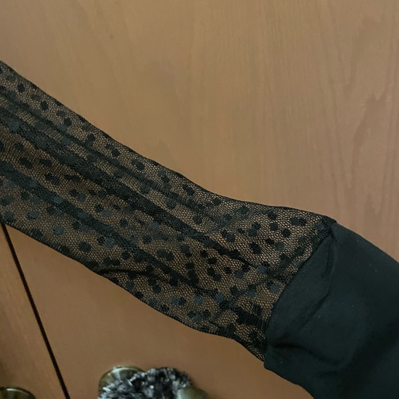 Black pullover blouse with polka dotted shoulder and arms. Size 42 or Medium - Picture 8 of 10